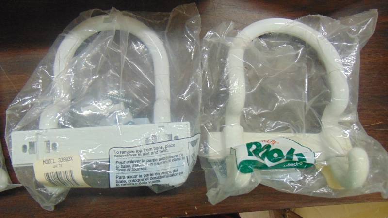 lot 568 image: cell phones and chargers - new coat hooks