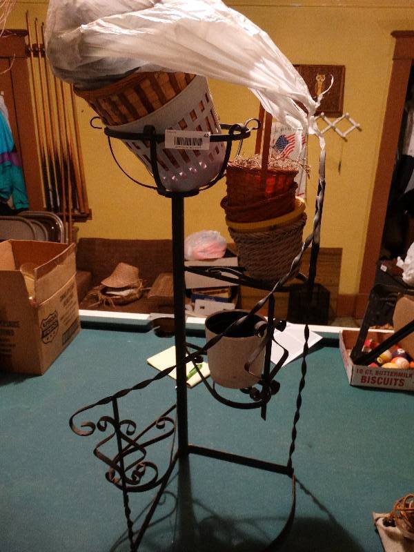 lot 42 image: Wrought iron plant stand.