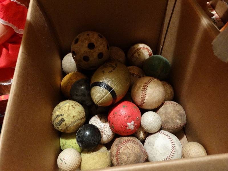 lot 55 image: Box of various balls.