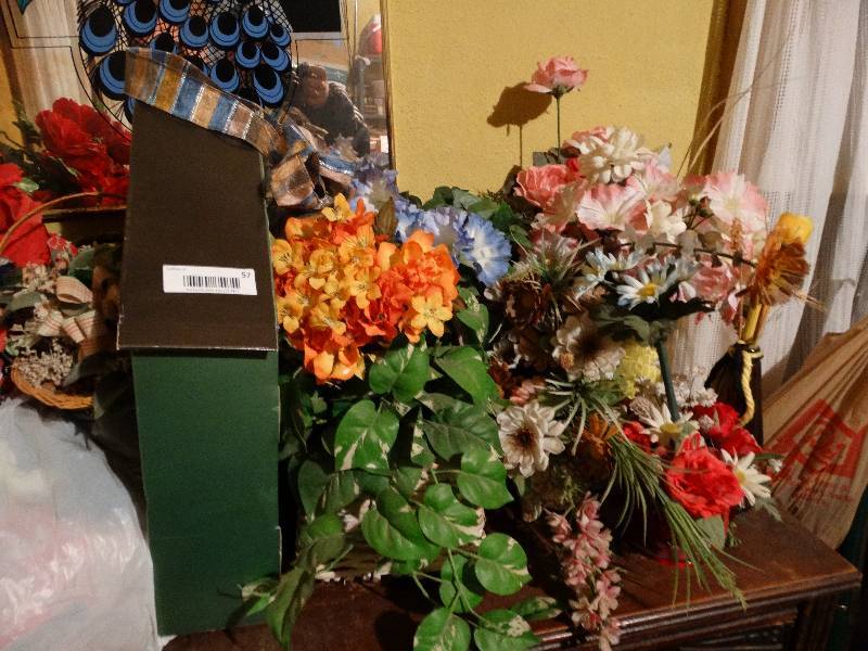 lot 57 image: Large lot of faux flowers.