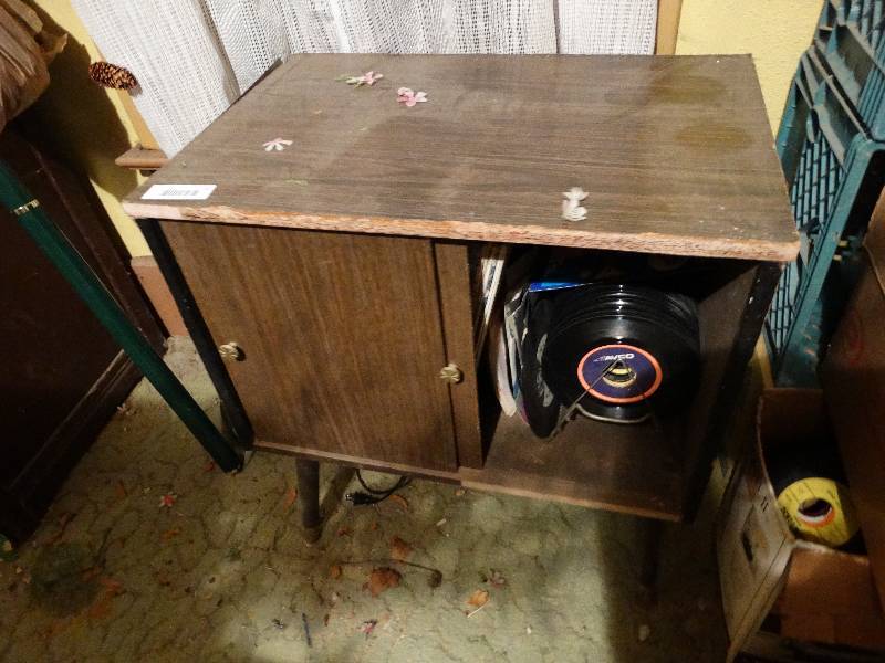 lot 62 image: Record cabinet wrecords one leg broke.