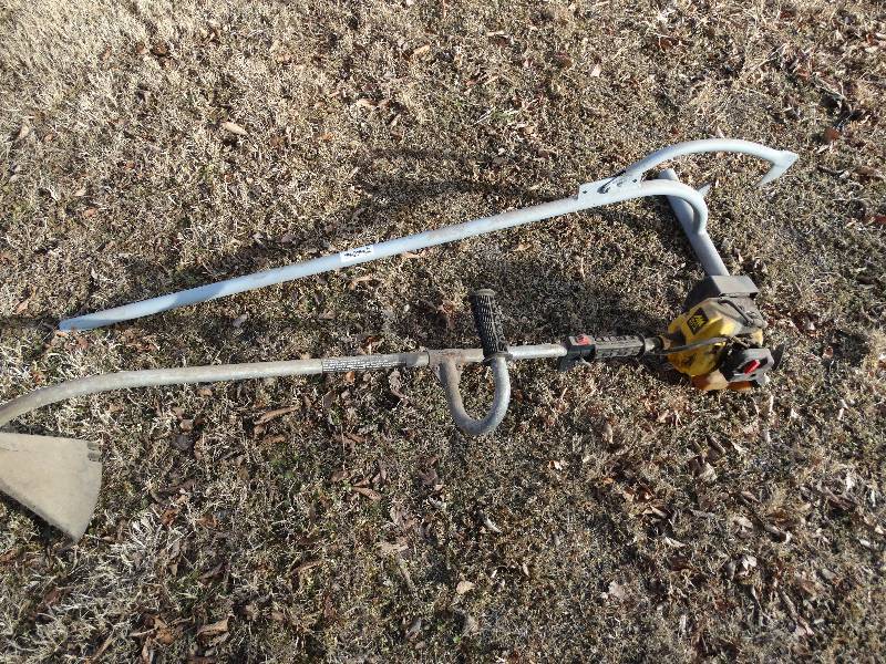lot 148 image: Gas weed eater & log grabber