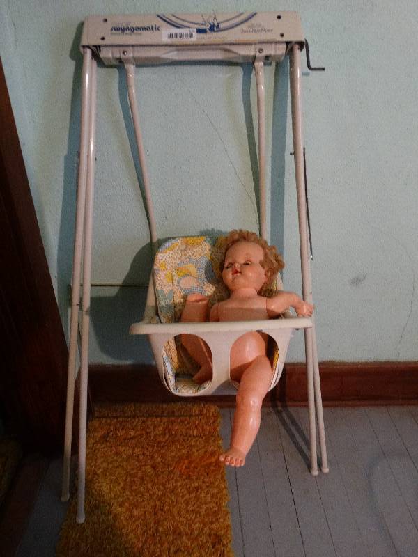 lot 174 image: Baby swing w doll
