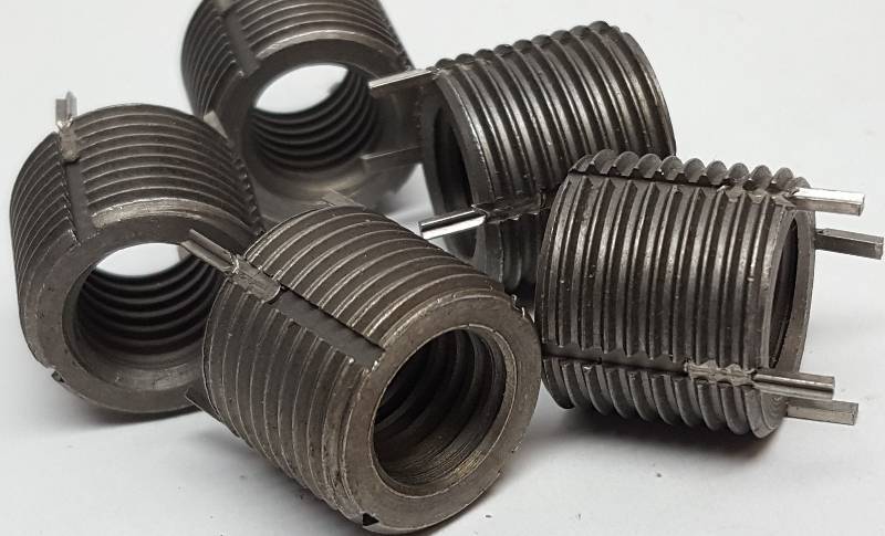 lot 5334 image: New Package of 5 Rock Solid 12 - 13 thread repair C1215 HD Carbon Steel inserts.