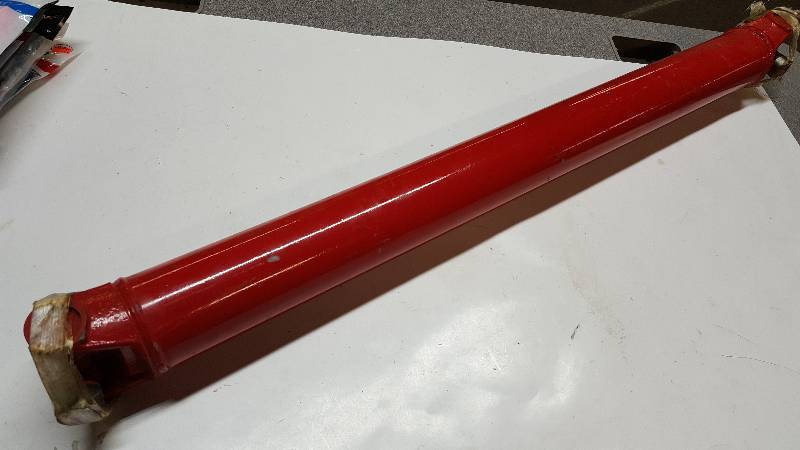 lot 5329 image: Modified for a street rod is this new U-jointed 33 long custom drive shaft.  Made with the new 1350 U-Joints