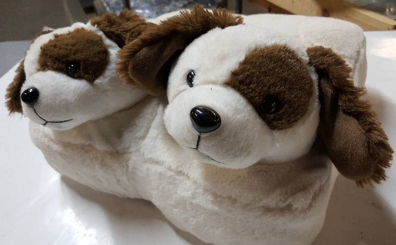 lot 5321 image: I thought this was foot warmer until I now see it has a battery powered massage vibrator inside.