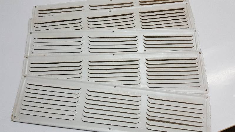 lot 5482 image: 5 new intake air vents for placement in the under roof soffits to allow fresh air into the attic measures 15 X 4