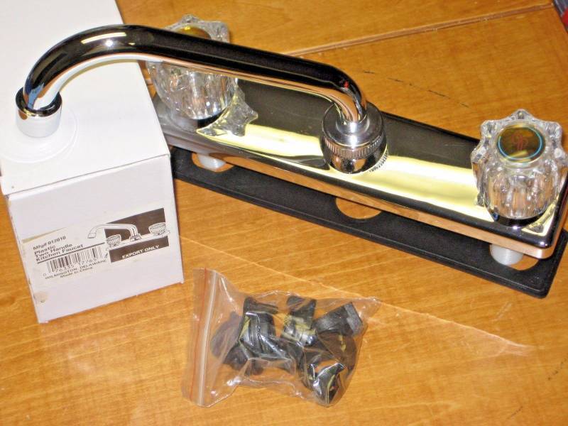 lot 6173 image: New Chrome 8 centers Kitchen sink or counter top faucet 2 knob plastic assembly.