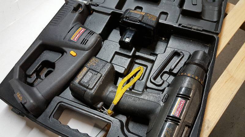 lot 5238 image: 12 volt battery powered drill and saw in the storage case