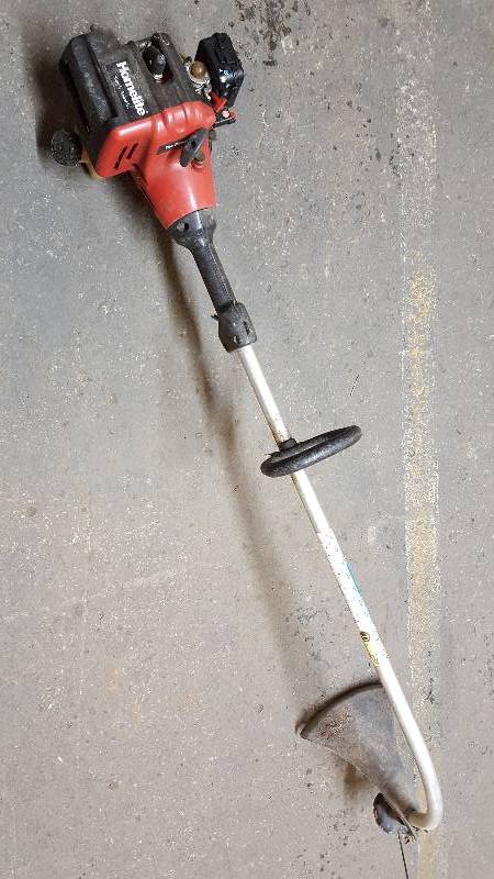 lot 5223 image: As with most weed eaters this one has been in the shed for 2 years and never started in that time.  It does have compression