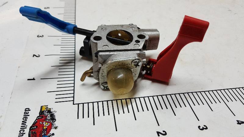 lot 5308 image: Not a clue what this small carburetor might be off of.  Looks new and like a weed eater of small gas engine of that type