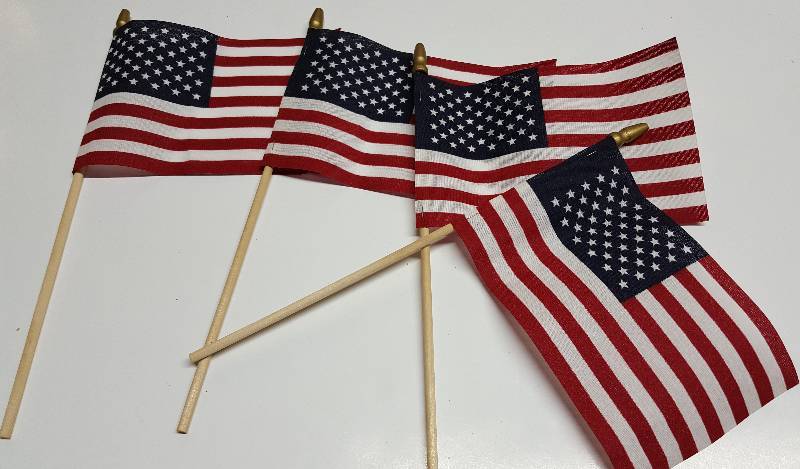 lot 5259 image: 4 new American flags for celebrations or decorations 10-12 stick and 4 X 6 Flag