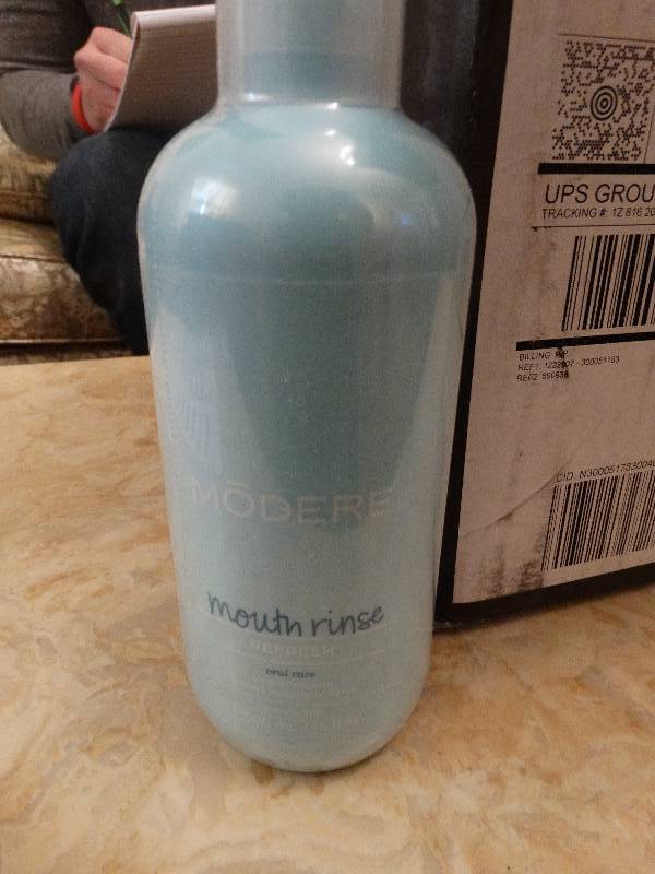 lot 309 image: 11 new bottles of Modere mouth rinse