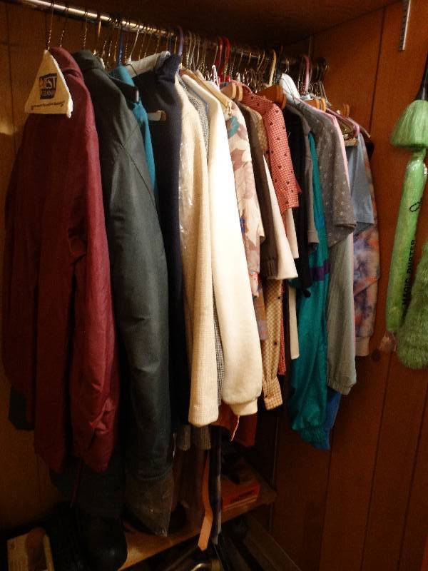 lot 335 image: Contents of closet- rubber boots clothes sweeper misc.