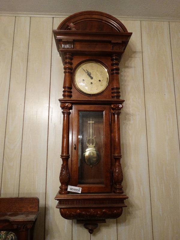 lot 366 image: Beautiful wood wall clock w key