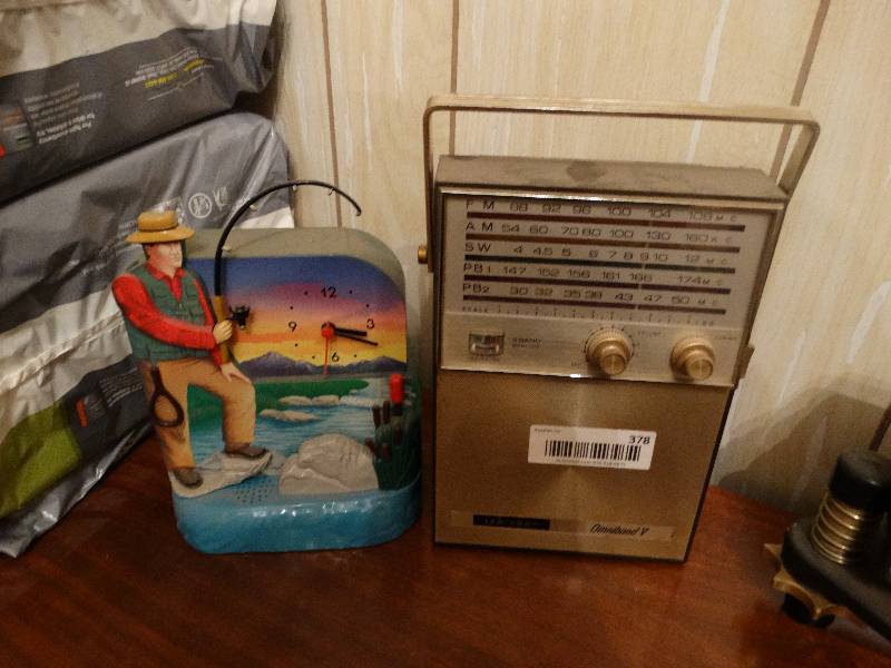 lot 378 image: Old radio & fishing clock