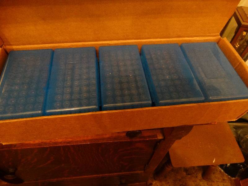 lot 391 image: 10 plastic containers w 9mm luger brass for reloading