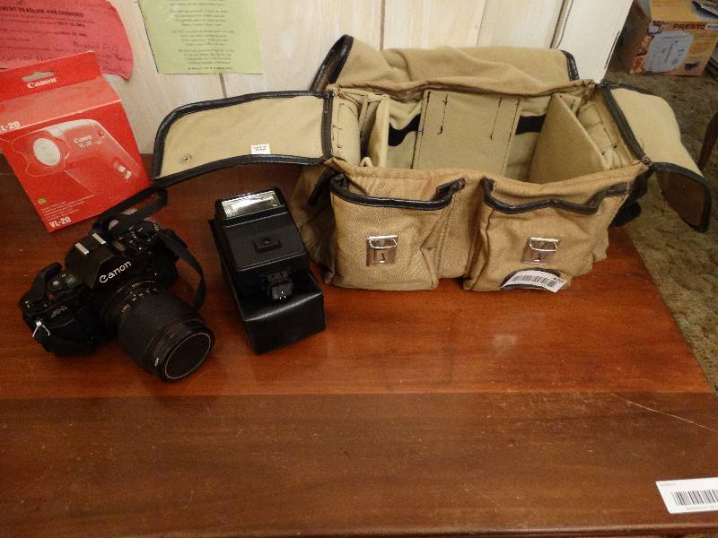 lot 429 image: Canon A-1 camera w bag & extras