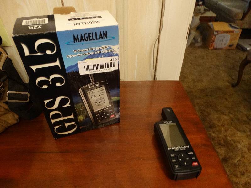 lot 430 image: Magellan GPS 315 in box
