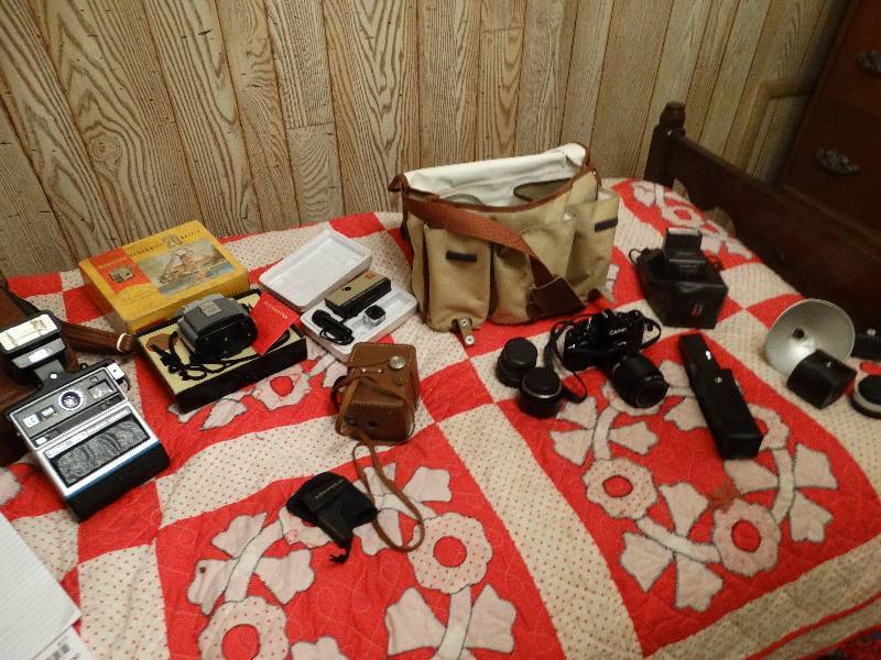 lot 476 image: Lg lot of cameras & supplies- Canon A-1 w bag
