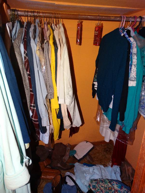 lot 488 image: Contents of closet- clothes hats misc.