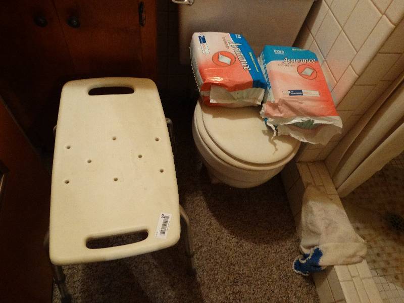 lot 506 image: Shower bench- 2 packages of under pants misc.