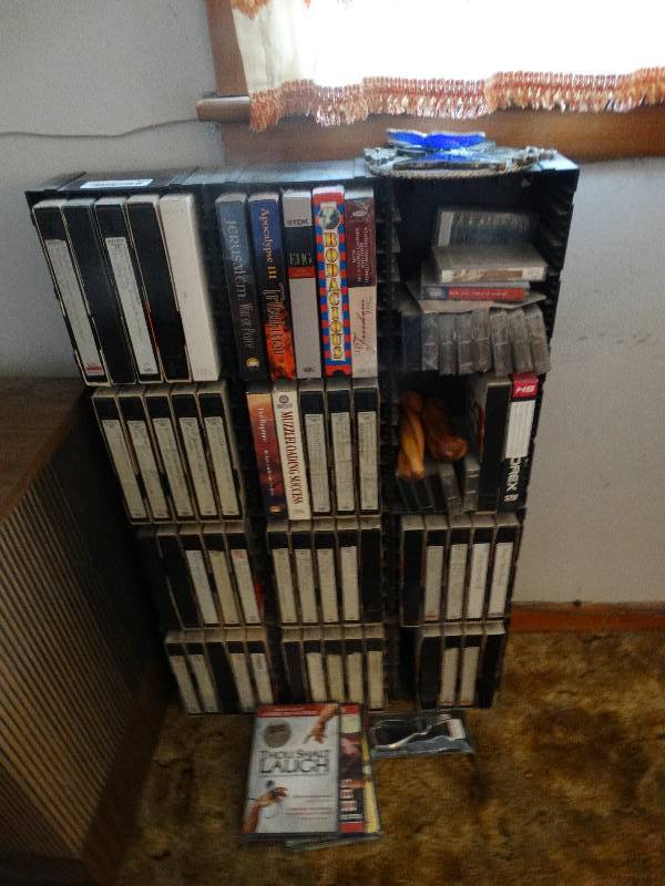 lot 534 image: Lot of VHS tapes and cabinet
