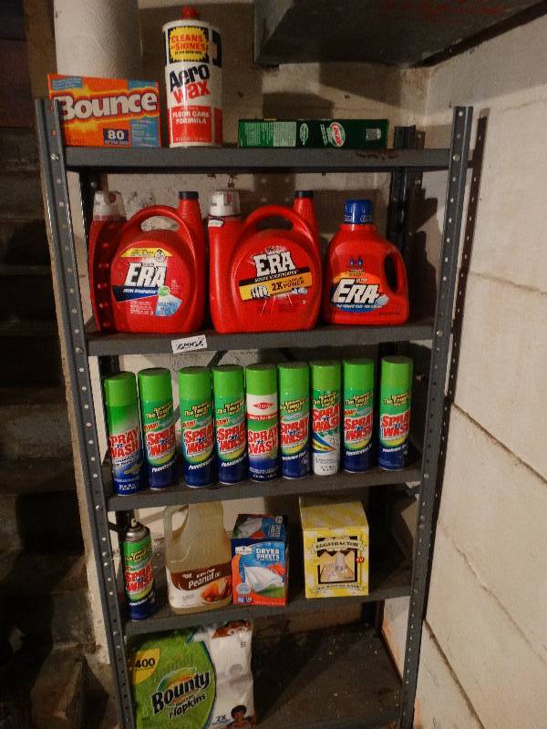 lot 568 image: Metal shelf w laundry soap & cleaners