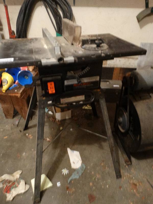 lot 680 image: Black & Decker 8 table saw w stand