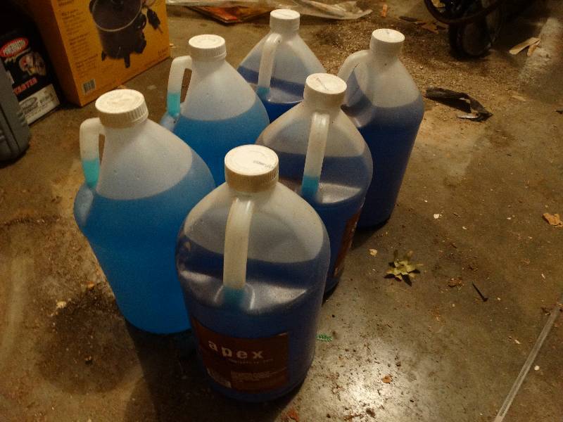 lot 699 image: 6 gallons of wiper fluid