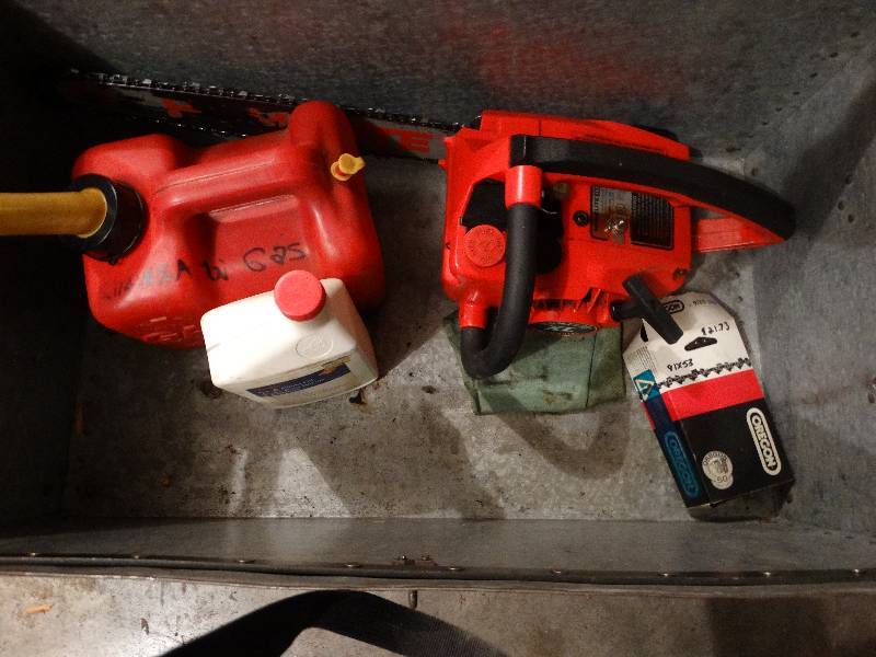 lot 707 image: Homelite chainsaw wcase, gas can, oil, misc.