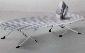 lot 9311 image: Retractable Ironing board 12in X 31in X 8in