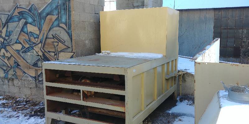 lot 12 image: 2 Yard Trash Compactor