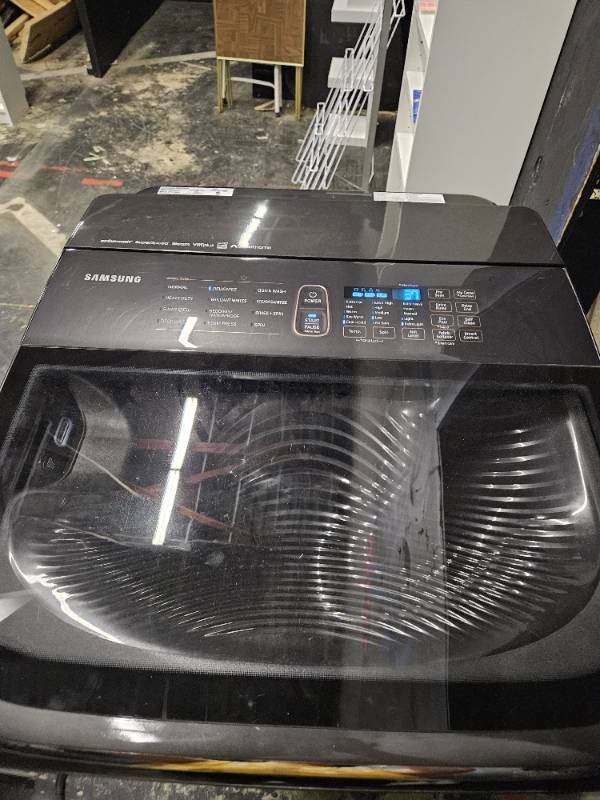 lot 848 image: Samsung Washer Model # WA54M8750AVA4, powered on and top control panel worked, unable to test with water. Samsung Dryer model #DVE54M8750VA3, unable to test, both units look used