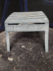 lot 123 image: Old plastic foot bench for outside, or for display