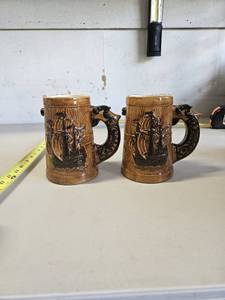 lot 136 image: Set of 2 ceramic Sail Boat Steins for home decor, no markings unknown brand