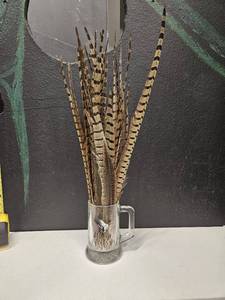 lot 167 image: Glass mug full of geese feathers, cup is personalized but can be redone