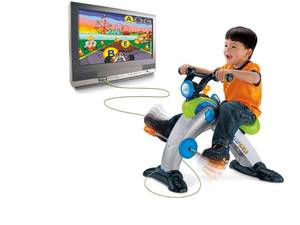 lot 195 image: Fisher-Price Smart Cycle Racer Physical Learning Arcade System, used and dusty from storage but comes with a learning game already in it and also a bonus Thomas & Friends game