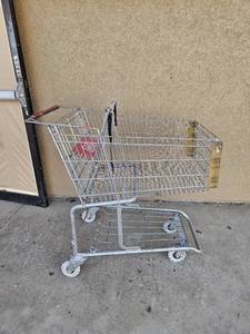 lot 211 image: Used Shopping cart from Tuesday mornings, needs new wheels