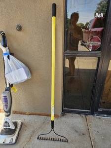 lot 231 image: Lightly Used Long Handle metal rake, are you ready for those fall leaves yet