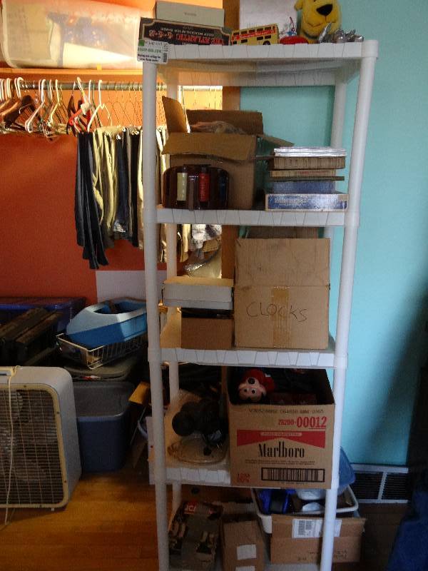 lot 6525 image: Rack of Collectibles