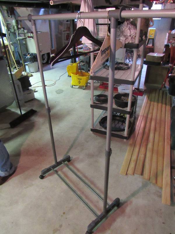 lot 6416 image: Rolling Garment Rack 57 w x 67 T