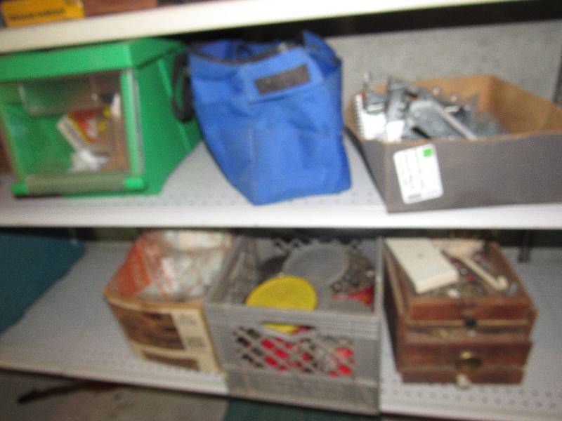 lot 6424 image: Contents of bottom (2) shelves nuts bolts, rafter brackets, tool bag, hand tools