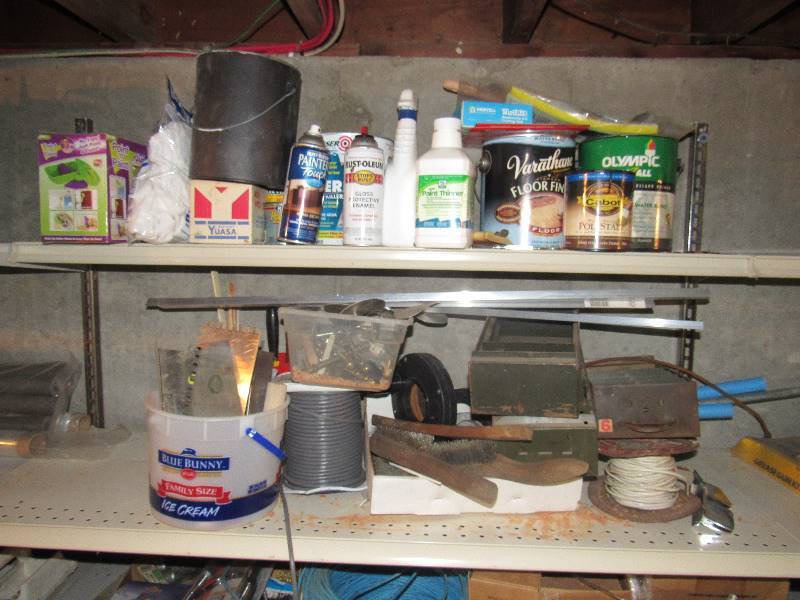 lot 6425 image: Contents of top (2 ) shelves stain, paint thinner, painting supplies, hardware, etc. 
