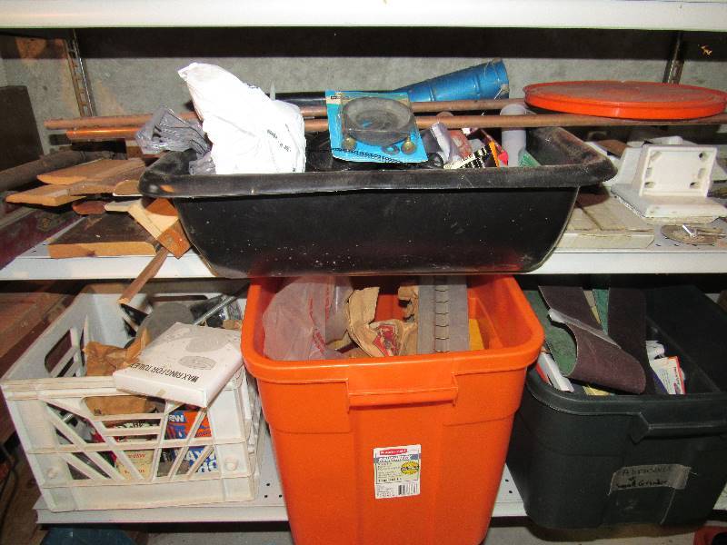 lot 6428 image: Contents of bottom (2) shelves plumbing supplies, bathroom fixtures, nails, sand paper and wheels