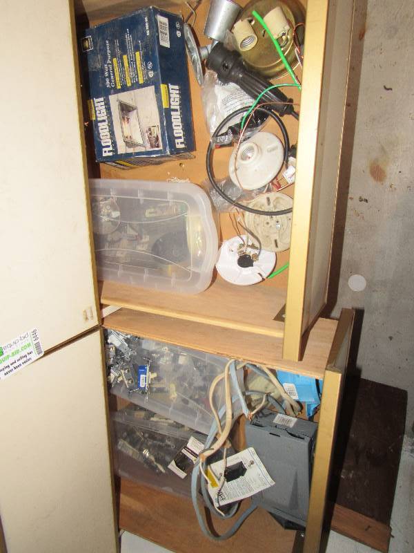 lot 6447 image: Contents of middle (2) drawers electrical outlets, switches and fixtures