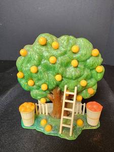 lot 129 image: Vintage Plastic Orange Napkin Holder with Salt & Pepper Shakers