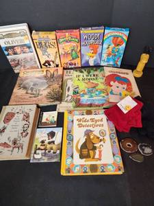 lot 326 image: Vintage Childrens Books, New Gloves, and VHS Movies