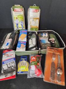 lot 384 image: New Fishing Supplies, (2) New Coleman Light Wt. Rain Suits (size medium), New Hobo Tool, and First Aid Kit