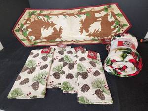 lot 16 image: New Christmas Table Runner, (4) New Kitchen Towels, and New Fleece Lap Blanket